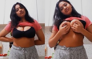 Cute chubby girl showing her big tankers