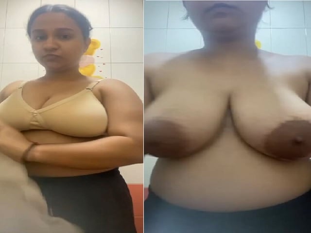 Tanker maal stripping bra and showing huge boobs