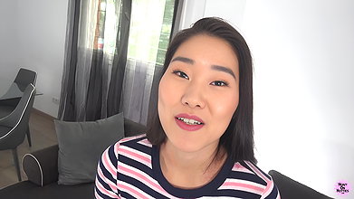 Chinese Japanese Smiley Faced beauty fucks a fan